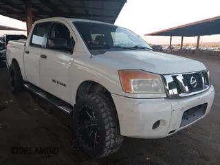 2009 Nissan Titan SE with VIN 1N6AA07D89N304717, listed as a IAAI auction lot 42451382 with 239,865 mi miles and . Bid and sale history available at DreamBid. Image 1.