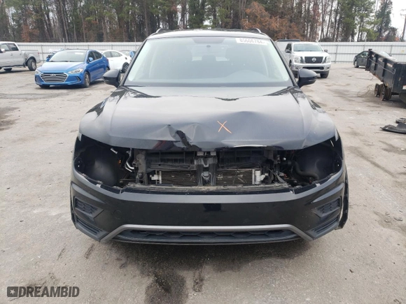 2021 Volkswagen Tiguan S with VIN 3VV1B7AX2MM017521, listed as a Copart auction lot 85606784 with 92,075 mi miles and Salvage Title. Bid and sale history available at carsss.com. Image 5.