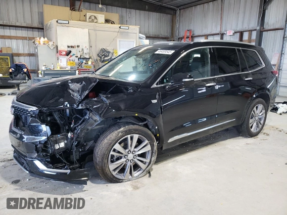 2023 Cadillac XT6 AWD Premium Luxury with VIN 1GYKPFRS3PZ121942, listed as a Copart auction lot 46489545 with 35,453 mi miles and Salvage Title. Bid and sale history available at DreamBid. Image 1.