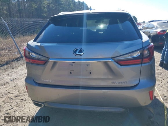 2017 Lexus RX with VIN 2T2ZZMCA8HC072487, listed as a IAAI auction lot 41161196 with 119,897 mi miles. Bid and sale history available at carsss.com. Image 16.