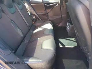 2016 Tesla Model S 90D z VIN 5YJSA1E27GF172611, wystawiony jako Copart lot #49434005 z przebiegiem 175 665 mil mil oraz Szkoda całkowita • Salvage title. Historia ofert i sprzedaży dostępna na DreamBid. Obrazek 10.