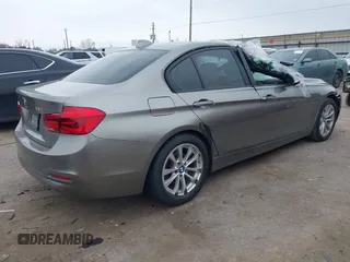 2018 BMW 3 Series 320i with VIN WBA8E1G51JNU92342, listed as a IAAI auction lot 41641934 with 27,477 mi miles. Bid and sale history available at carsss.com. Image 4.