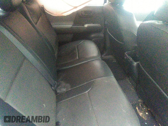 2018 Toyota Tacoma SR5 with VIN 3TMAZ5CN3JM066409, listed as a IAAI auction lot 41204775 with 75,000 mi miles and . Bid and sale history available at DreamBid. Image 8.