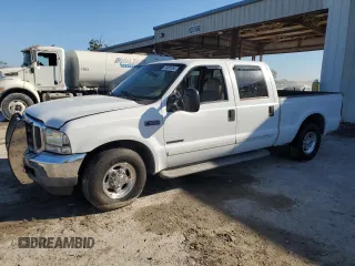 2001 Ford Super Duty F-250 XL with VIN 1FTNW20F61EB42376, listed as a Copart auction lot 74001054 with 215,944 mi miles and Salvage Title. Bid and sale history available at carsss.com. Image 1.