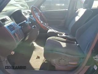 1998 Honda CR-V EX with VIN JHLRD1860WC055679, listed as a Copart auction lot 77705944 with 285,384 mi miles and Salvage Title. Bid and sale history available at carsss.com. Image 7.