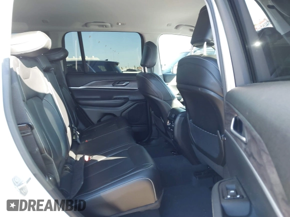 2023 Jeep Grand Cherokee Limited with VIN 1C4RJGBG2PC521012, listed as a IAAI auction lot 41145914 with 51,686 mi miles and . Bid and sale history available at DreamBid. Image 8.