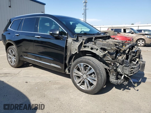 2021 Cadillac XT6 Premium Luxury with VIN 1GYKPDRS4MZ175962, listed as a Copart auction lot 59993565 with 97,157 mi miles and Salvage title. Bid and sale history available at DreamBid. Image 4.