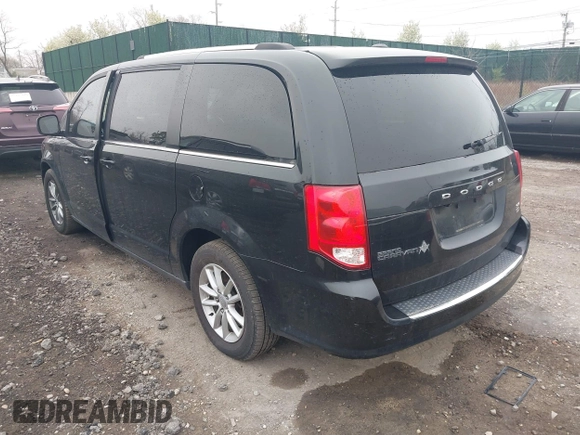 2019 Dodge Grand Caravan SXT with VIN 2C4RDGCG6KR749505, listed as a IAAI auction lot 42087083 with 167,551 mi miles and . Bid and sale history available at DreamBid. Image 3.