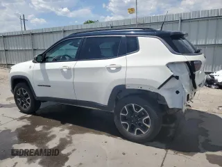 2020 Jeep Compass Trailhawk with VIN 3C4NJDDB1LT189240, listed as a Copart auction lot 57876235 with 70,309 mi miles and Salvage title. Bid and sale history available at DreamBid. Image 2.