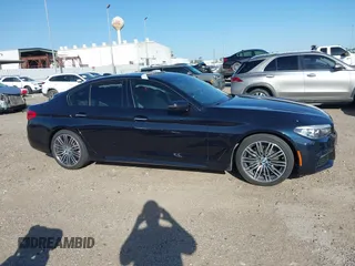 2018 BMW 5 Series 530i with VIN WBAJA5C59JWA38170, listed as a IAAI auction lot 41682219 with 61,990 mi miles and . Bid and sale history available at carsss.com. Image 13.