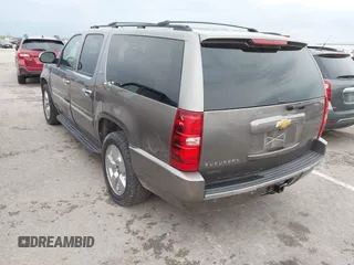 2011 Chevrolet Suburban LTZ with VIN 1GNSKKE32BR197356, listed as a IAAI auction lot 42052377 with 248,574 mi miles and . Bid and sale history available at DreamBid. Image 3.