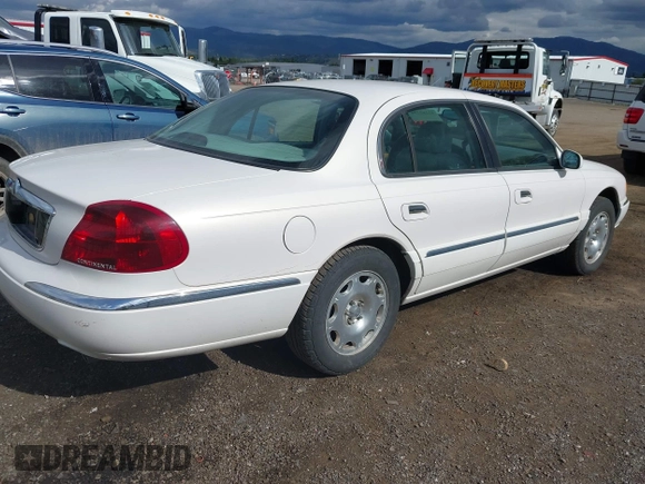 1999 Lincoln Continental с VIN 1LNHM97V2XY708917, выставлен на аукционе IAAI как лот 42282254 с пробегом 283 827 миль миль и . История ставок и продаж доступна на DreamBid. Изображение 4.