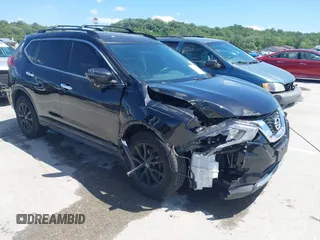 2017 Nissan Rogue SL z VIN 5N1AT2MV8HC822760, wystawiony jako IAAI lot #42319783 z przebiegiem 136 460 mil mil oraz . Historia ofert i sprzedaży dostępna na DreamBid. Obrazek 1.