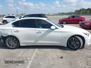 2020 Infiniti Q50 Luxe with VIN JN1EV7AP6LM201462, listed as a IAAI auction lot 42090939 with 50,633 mi miles and . Bid and sale history available at DreamBid. Image 14.