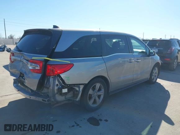 2019 Honda Odyssey EX-L with VIN 5FNRL6H76KB028490, listed as a IAAI auction lot 41636751 with 79,827 mi miles. Bid and sale history available at carsss.com. Image 4.