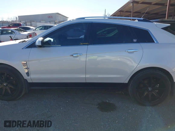 2011 Cadillac SRX Premium Collection with VIN 3GYFNCEY2BS624867, listed as a IAAI auction lot 41273945 with 209,296 mi miles. Bid and sale history available at carsss.com. Image 14.