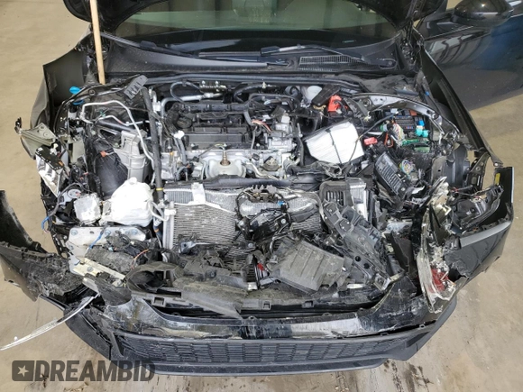 2025 Honda Civic Sport z VIN 2HGFE2F57SH522389, wystawiony jako Copart lot #46955815 z przebiegiem Nie podano mil oraz Szkoda całkowita • Salvage title. Historia ofert i sprzedaży dostępna na DreamBid. Obrazek 12.