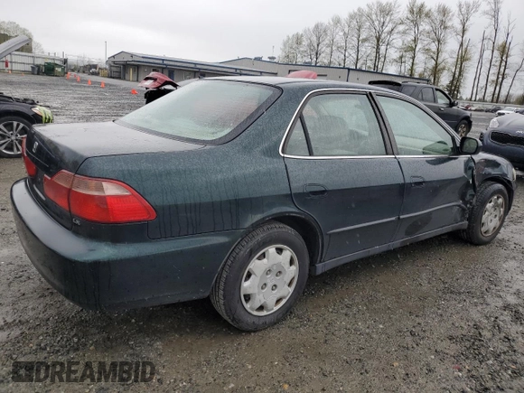 2000 Honda Accord LX z VIN 1HGCG5648YA154043, wystawiony jako Copart lot #51854515 z przebiegiem 176 150 mil mil oraz Szkoda całkowita • Salvage title. Historia ofert i sprzedaży dostępna na DreamBid. Obrazek 3.