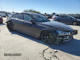 2018 BMW 7 Series 750i with VIN WBA7F0C50JGM23350, listed as a Copart auction lot 80530694 with 0 mi miles and Salvage Title. Bid and sale history available at carsss.com. Image 4.