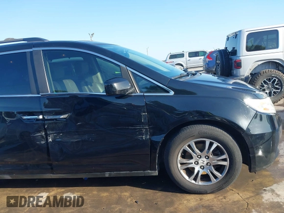 2013 Honda Odyssey EX-L with VIN 5FNRL5H6XDB090768, listed as a IAAI auction lot 42008759 with 116,052 mi miles and . Bid and sale history available at carsss.com. Image 17.