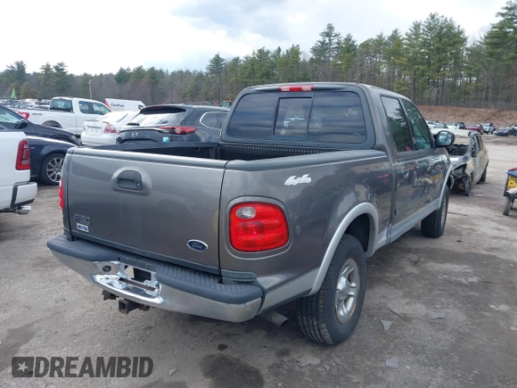 2003 Ford F-150 XLT with VIN 1FTRW08L63KA37275, listed as a IAAI auction lot 41875128 with 133,257 mi miles. Bid and sale history available at carsss.com. Image 4.
