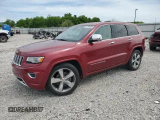 2015 Jeep Grand Cherokee Overland z VIN 1C4RJFCGXFC832095, wystawiony jako Copart lot #57284465 z przebiegiem 149 554 mil mil oraz Szkoda całkowita • Salvage title. Historia ofert i sprzedaży dostępna na DreamBid. Obrazek 1.