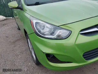 2013 Hyundai Accent SE with VIN KMHCU5AEXDU069586, listed as a IAAI auction lot 40968974 with 98,939 mi miles. Bid and sale history available at carsss.com. Image 12.