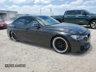 2013 BMW 3 Series 328i with VIN WBA3A5G55DNP21848, listed as a Copart auction lot 61733995 with 134,760 mi miles and Salvage title. Bid and sale history available at DreamBid. Image 4.