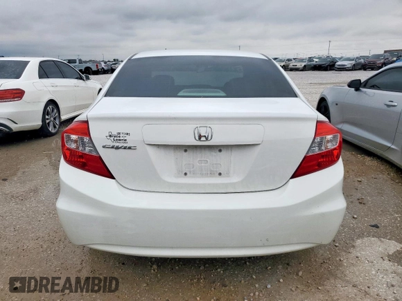 2012 Honda Civic LX z VIN 2HGFB2F50CH607469, wystawiony jako Copart lot #55878635 z przebiegiem 86 975 mil mil oraz Szkoda całkowita • Salvage title. Historia ofert i sprzedaży dostępna na DreamBid. Obrazek 6.
