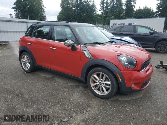 2014 MINI Countryman S with VIN WMWZC3C53EWP25410, listed as a Copart auction lot 62900915 with 122,088 mi miles and Clean title. Bid and sale history available at DreamBid. Image 4.