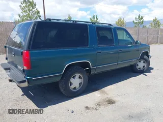 1997 Chevrolet Suburban with VIN 3GNFK16R1VG167865, listed as a IAAI auction lot 42147770 with 201,946 mi miles and . Bid and sale history available at DreamBid. Image 4.