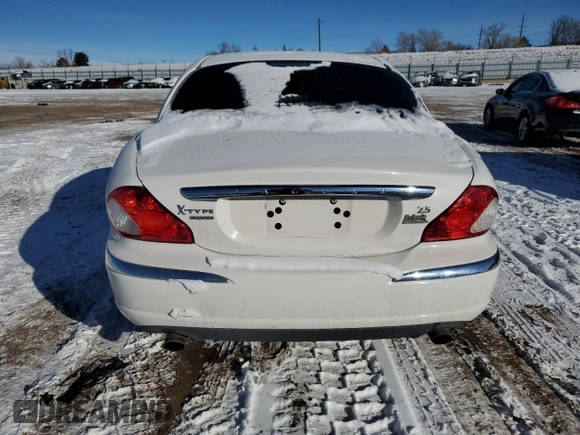 2005 Jaguar X-Type z VIN SAJWB52D95XE21462, wystawiony jako Copart lot #89216475 z przebiegiem 114 257 mil mil oraz Szkoda całkowita • Salvage title. Historia ofert i sprzedaży dostępna na DreamBid. Obrazek 6.