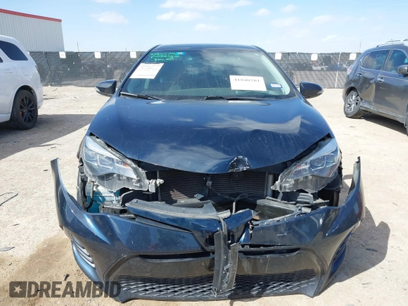 2019 Toyota Corolla L with VIN 2T1BURHE0KC154489, listed as a IAAI auction lot 41840201 with 112,248 mi miles and . Bid and sale history available at DreamBid. Image 12.