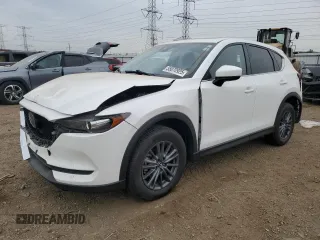 2021 Mazda CX-5 Touring z VIN JM3KFBCM0M1428594, wystawiony jako Copart lot #55070925 z przebiegiem 55 698 mil mil oraz Szkoda całkowita • Salvage title. Historia ofert i sprzedaży dostępna na DreamBid. Obrazek 1.
