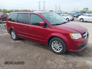 2014 Dodge Grand Caravan SXT with VIN 2C4RDGCG4ER120877, listed as a IAAI auction lot 42142083 with 199,895 mi miles and . Bid and sale history available at DreamBid. Image 1.
