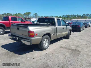 2002 Chevrolet Silverado 1500 LS with VIN 2GCEK19V721268944, listed as a IAAI auction lot 41822816 with 143,281 mi miles. Bid and sale history available at carsss.com. Image 4.