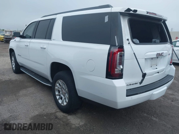 2019 GMC Yukon XL SLT z VIN 1GKS1GKC8KR395425, wystawiony jako IAAI lot #41910104 z przebiegiem 105 760 mil mil oraz . Historia ofert i sprzedaży dostępna na DreamBid. Obrazek 3.