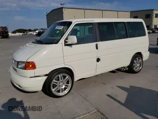 2003 Volkswagen EuroVan с VIN WV2KB47063H019062, выставлен на аукционе Copart как лот 75887824 с пробегом 82 616 миль миль и Чистый • Clean title. История ставок и продаж доступна на DreamBid. Изображение 1.