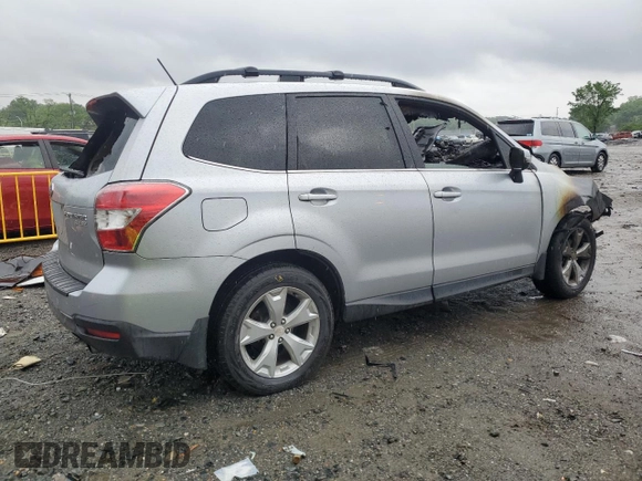 2014 Subaru Forester Touring with VIN JF2SJAPC3EH534700, listed as a Copart auction lot 56940105 with Not provided miles and Salvage title. Bid and sale history available at DreamBid. Image 3.