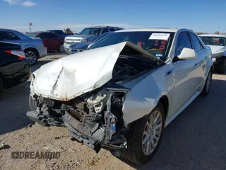 2013 Cadillac CTS Luxury with VIN 1G6DF5E51D0165324, listed as a IAAI auction lot 42099692 with 163,758 mi miles and . Bid and sale history available at DreamBid. Image 6.