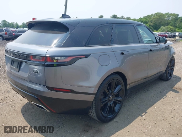 2020 Land Rover Range Rover Velar z VIN SALYM2EV8LA274870, wystawiony jako IAAI lot #42479938 z przebiegiem 43 039 mil mil oraz . Historia ofert i sprzedaży dostępna na DreamBid. Obrazek 4.