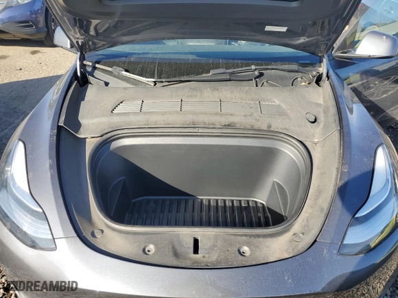 2022 Tesla Model Y Long Range with VIN 7SAYGDEE1NF575438, listed as a Copart auction lot 46539445 with 25,882 mi miles and Salvage Title. Bid and sale history available at carsss.com. Image 12.