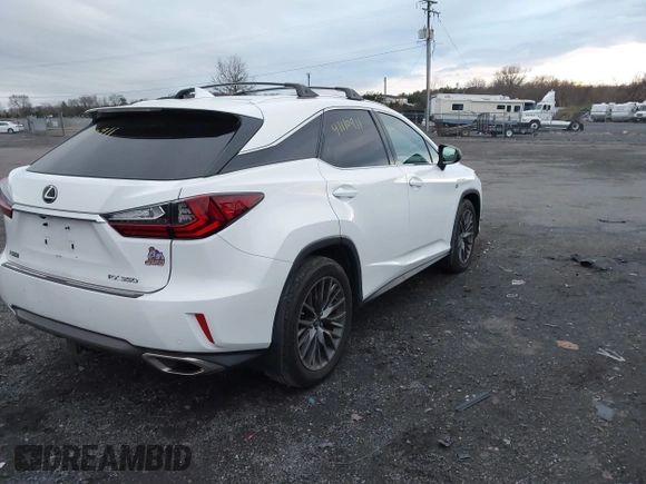2018 Lexus RX 350 with VIN 2T2BZMCA7JC165184, listed as a IAAI auction lot 41110911 with 74,965 mi miles and . Bid and sale history available at DreamBid. Image 4.