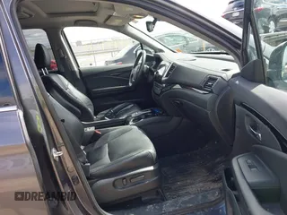2017 Honda Pilot Touring with VIN 5FNYF6H92HB036406, listed as a IAAI auction lot 41949223 with 147,462 mi miles. Bid and sale history available at carsss.com. Image 5.