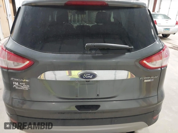 2016 Ford Escape Titanium with VIN 1FMCU9J93GUC39933, listed as a IAAI auction lot 42616323 with 116,482 mi miles and . Bid and sale history available at DreamBid. Image 16.