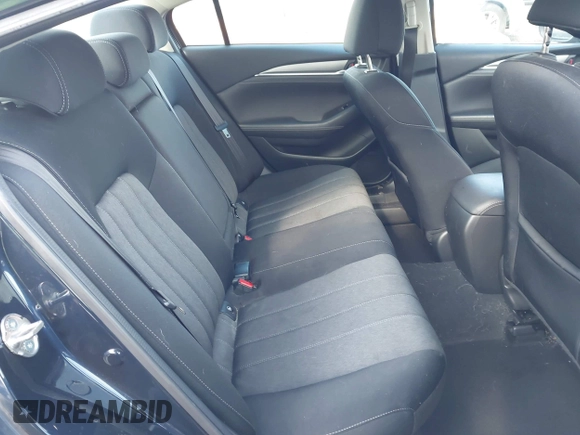 2020 Mazda 6 Sport with VIN JM1GL1UM5L1519519, listed as a IAAI auction lot 41920571 with 59,378 mi miles and . Bid and sale history available at DreamBid. Image 8.