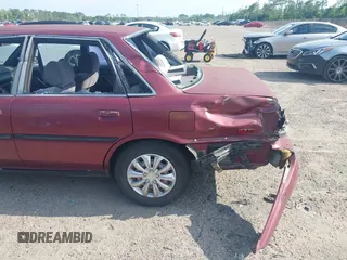 1991 Toyota Camry DLX z VIN 4T1SV21E0MU347371, wystawiony jako IAAI lot #42048695 z przebiegiem 209 451 mil mil oraz . Historia ofert i sprzedaży dostępna na DreamBid. Obrazek 11.