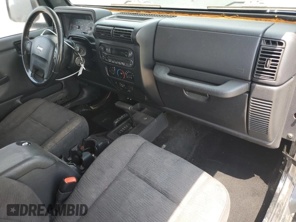 2005 Jeep Wrangler X z VIN 1J4FA39S75P321328, wystawiony jako Copart lot #59711505 z przebiegiem 126 768 mil mil oraz Szkoda całkowita • Salvage title. Historia ofert i sprzedaży dostępna na DreamBid. Obrazek 8.