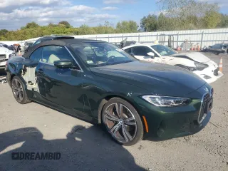 2023 BMW 4 Series 430i xDrive with VIN WBA43AT02PCM93518, listed as a Copart auction lot 73193044 with 15,520 mi miles and Salvage Title. Bid and sale history available at DreamBid. Image 4.