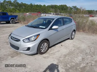 2012 Hyundai Accent GS with VIN KMHCT5AE9CU012569, listed as a IAAI auction lot 41834613 with 131,660 mi miles and . Bid and sale history available at DreamBid. Image 2.